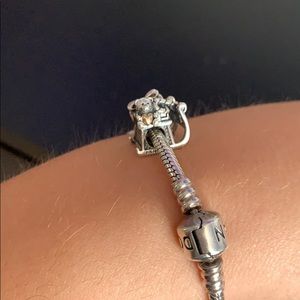 Santa’s sleigh pandora charm with gold detailing.